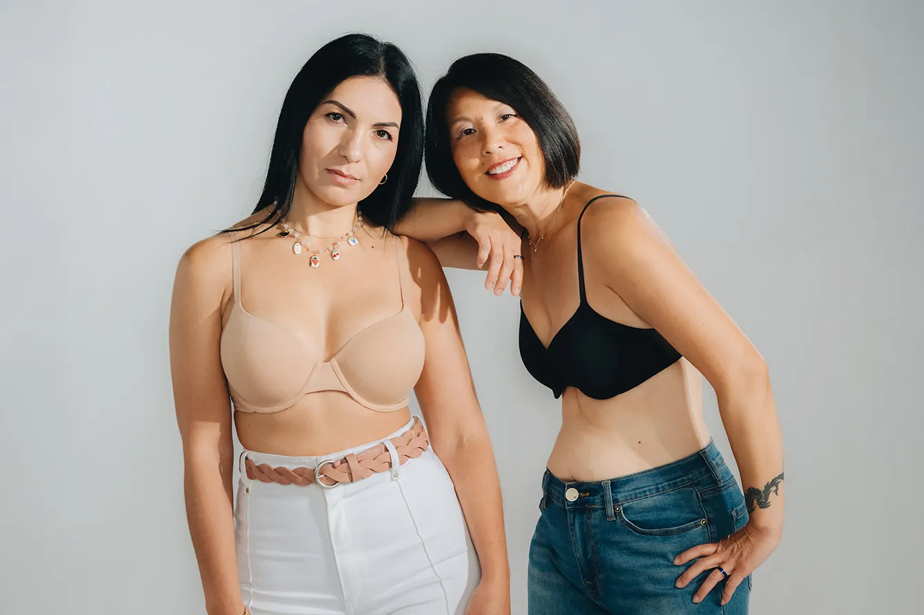 Teo women similing in bras