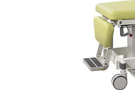 Foldaway footrest on mammography positioning chair in white background