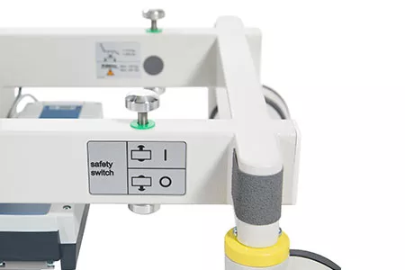 Safety switch on mammography positioning chair