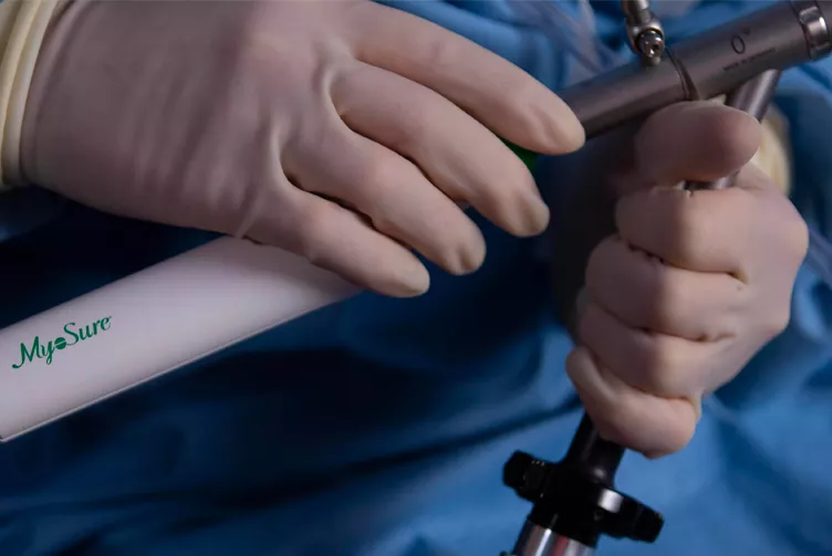 Medical Professional holding MyoSure® product