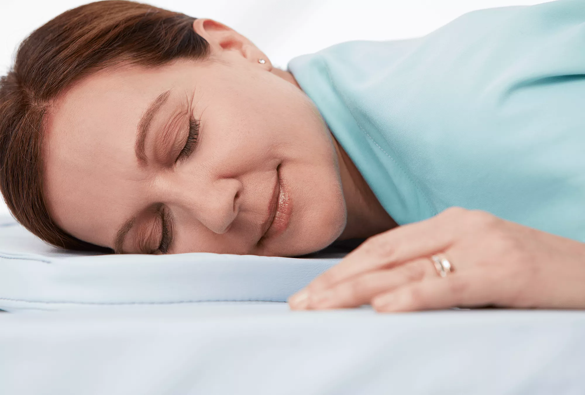 Woman patient lying down on bed comfortably with compassionate experience