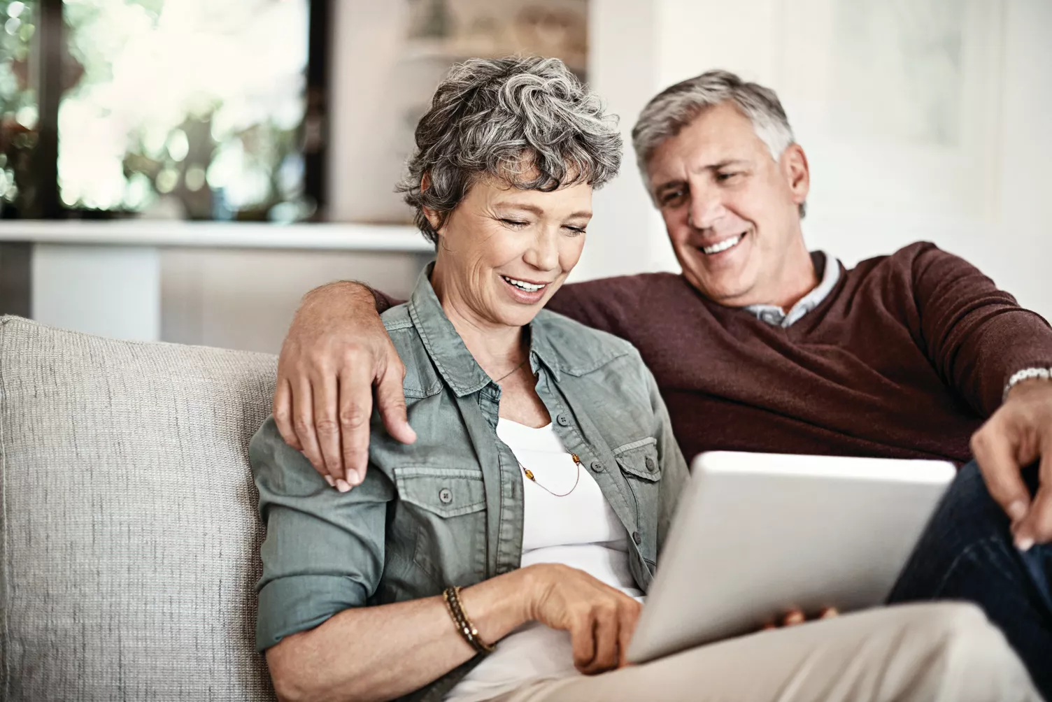 Elderly couple on the couch