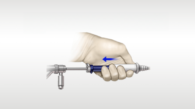 Illustration showing hand holding medical device