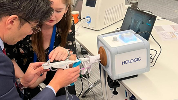 Professional training person on Hologic's hysteroscopy devices